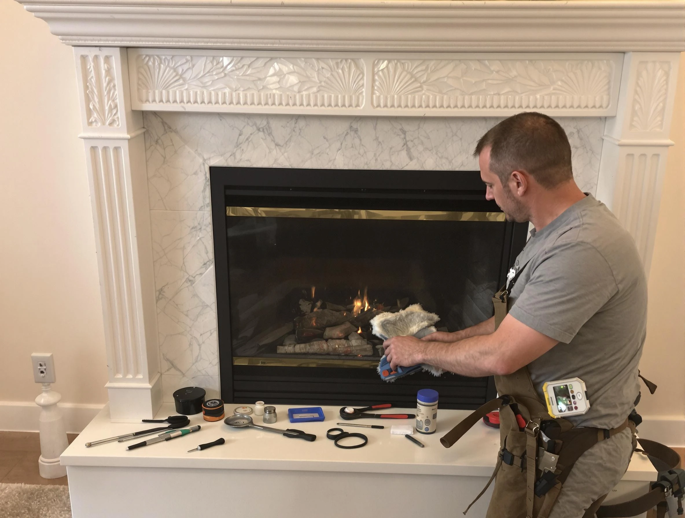 Johns Creek Chimney Sweep performing fireplace maintenance in Johns Creek, GA